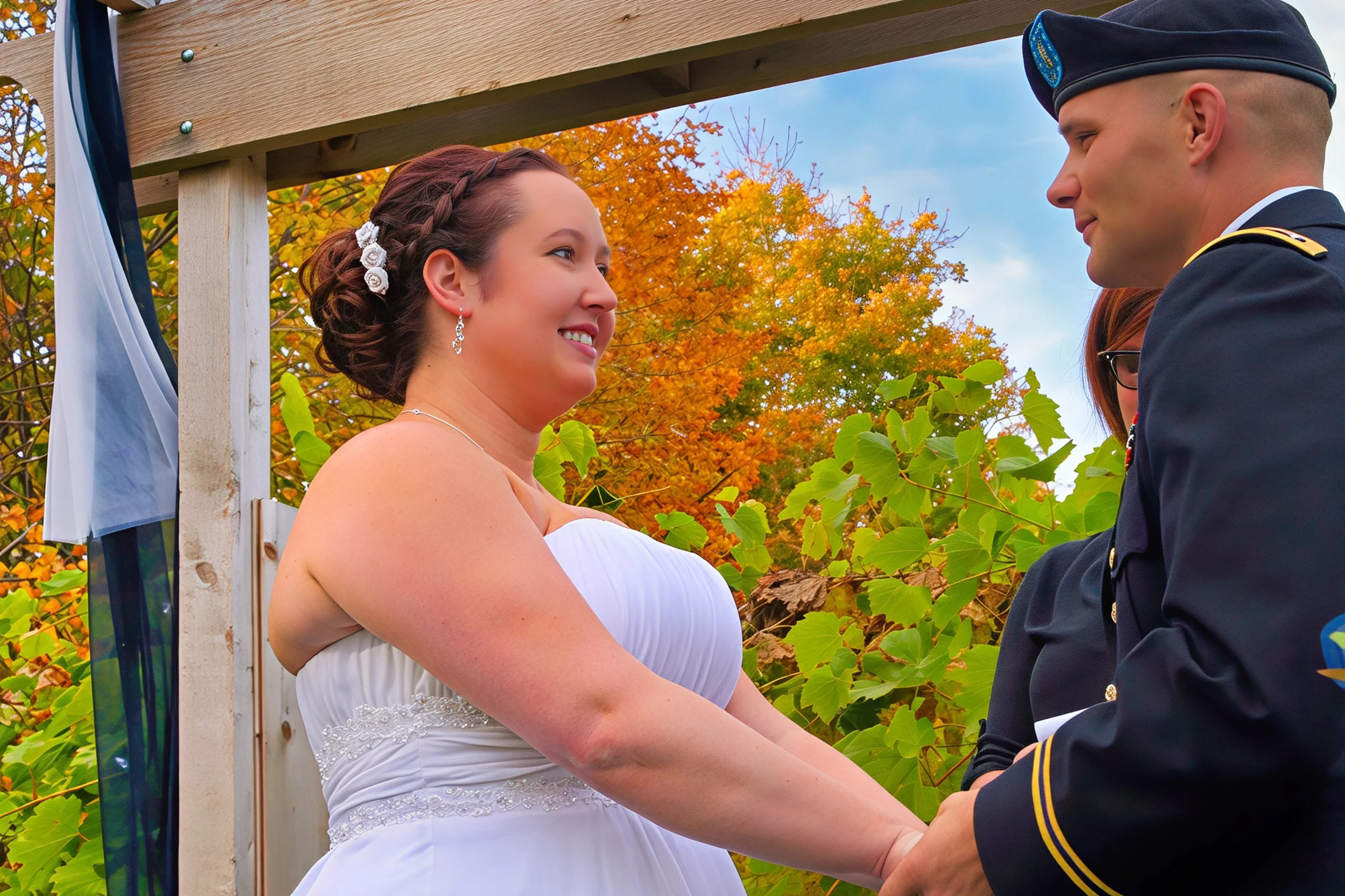 A bride and groom holding hands during their wedding ceremony outdoors with fall foliage in the background.