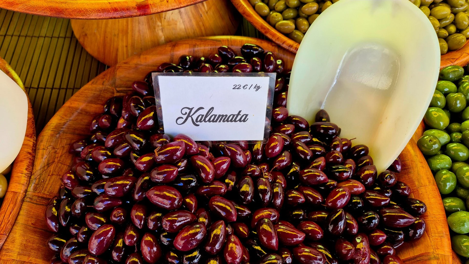 a picture of some kalamata olives at la pomponette olive stall at belves market