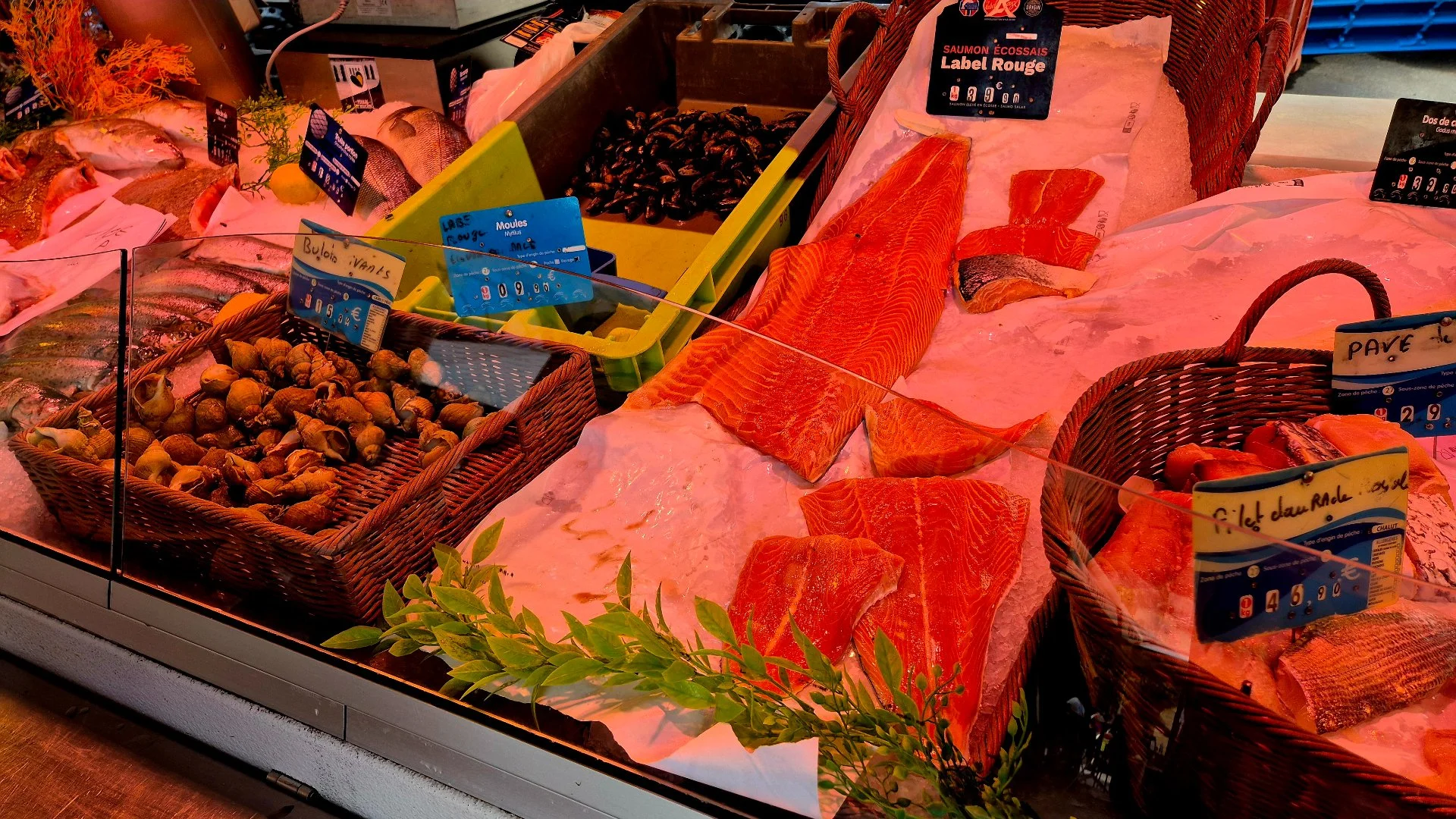 picture of belves market stall selling lovely pink fish and seafood.