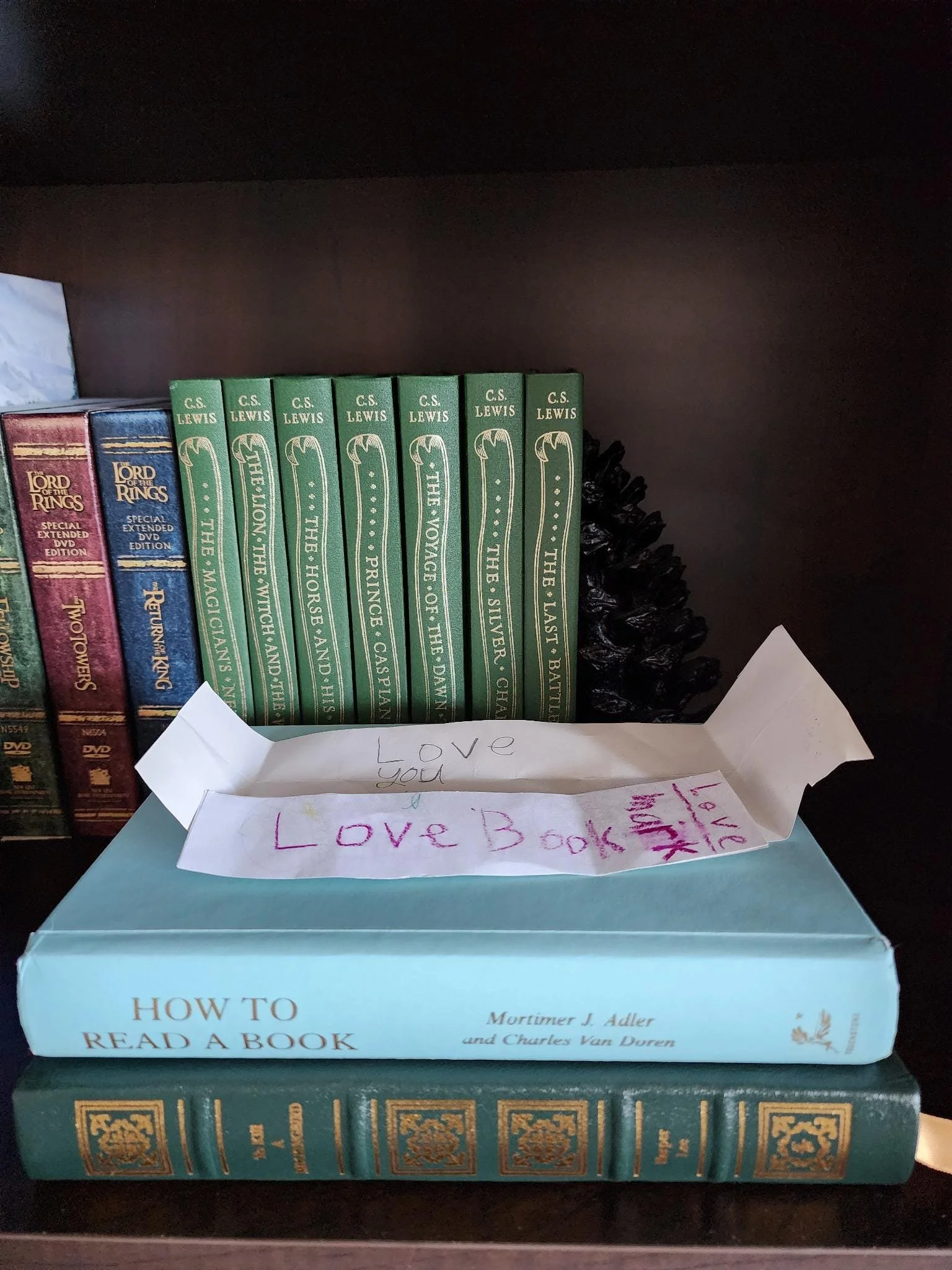 Happy Easter Sunday Stack. My current reads: To Kill a Mockingbird How to Read a Book (still not done) Plus a handmade bookmark my son made for me “because you love reading so much, Mama.” 😭