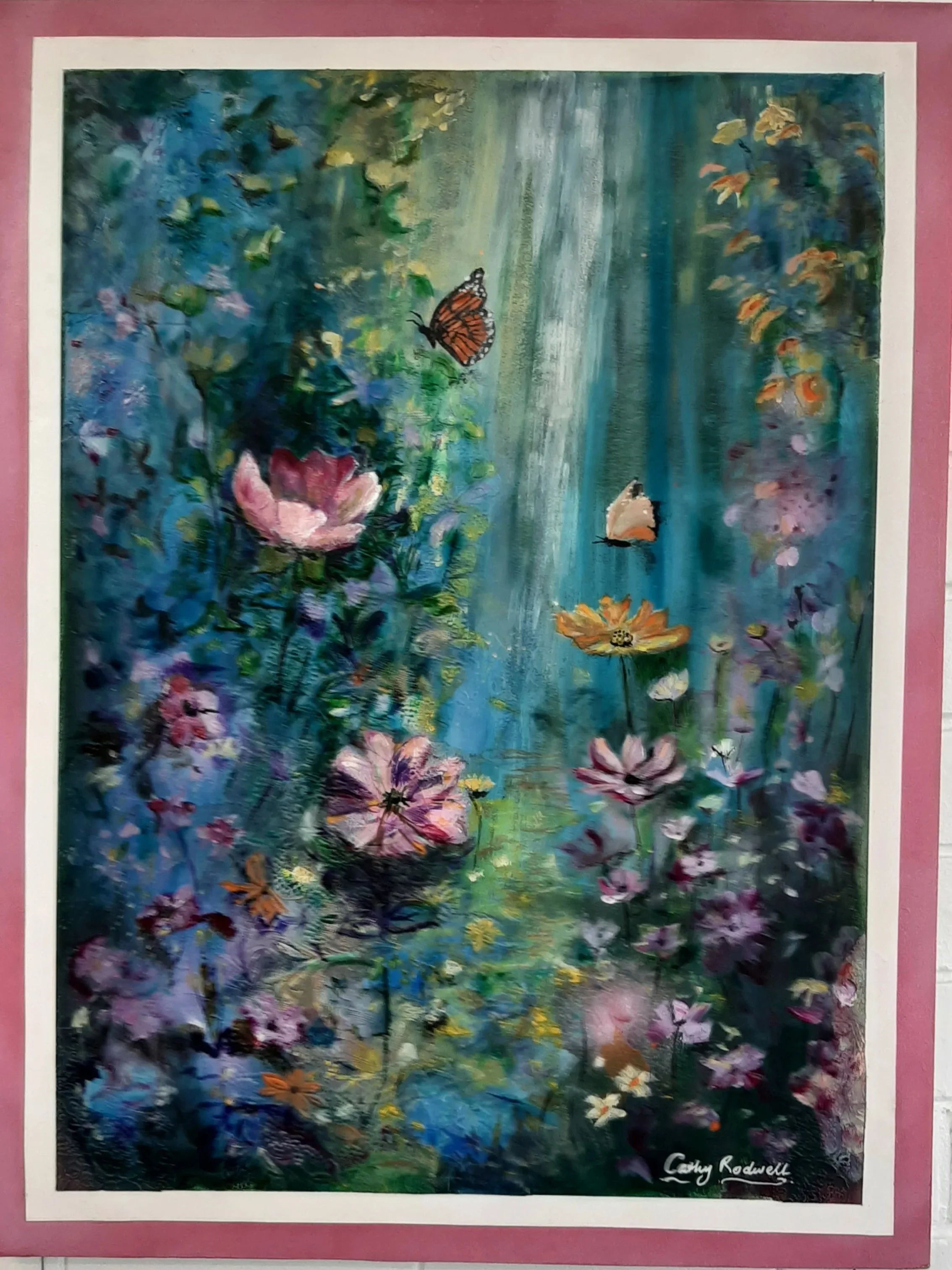 A colorful painting of a garden with various flowers, two butterflies, and a waterfall in the background. The painting is signed 'Cathy Redwell' in the bottom right corner.