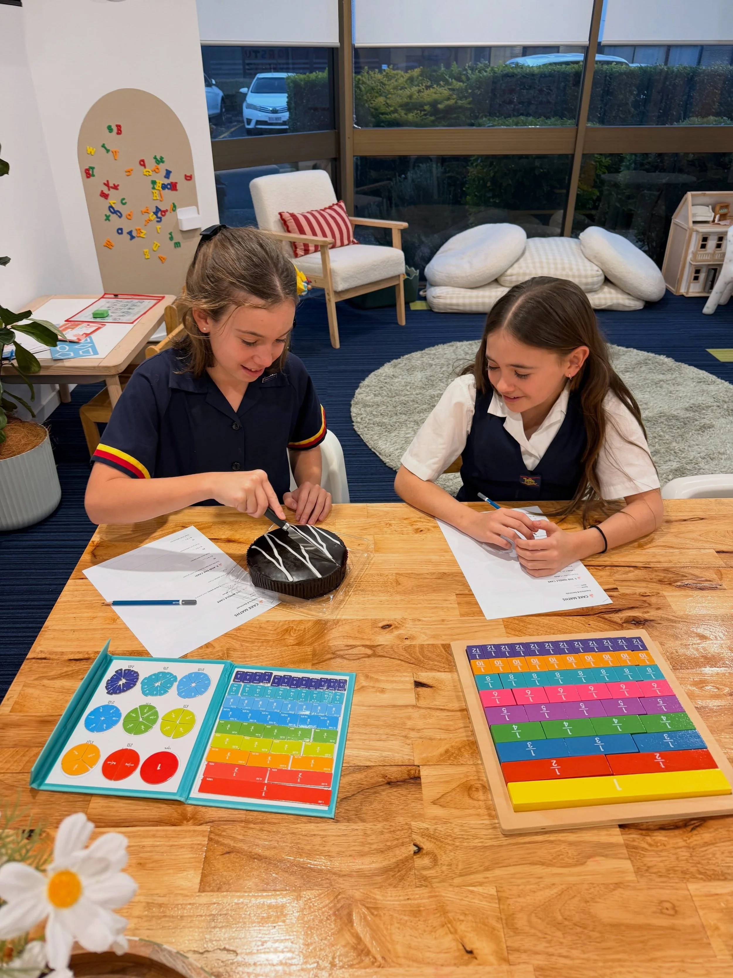 Halfway through Term 3! ✨

A few learning highlights from the term so far. Lots of hands-on literacy, numeracy, fine motor, art and play-based learning happening across our classes each week, including learning fractions with a real cake by cutting, 