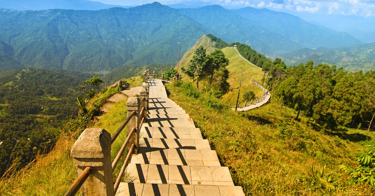 Stone walkway and railings along the Tarey Bhir ridge in South Sikkim