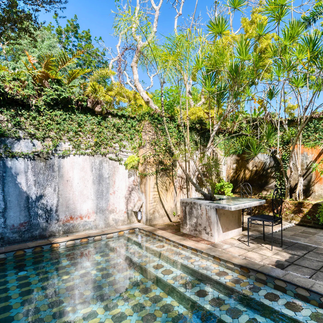 Garden terrace and water feature at Lunuganga, the former country estate of renowned Sri Lankan architect Geoffrey Bawa.