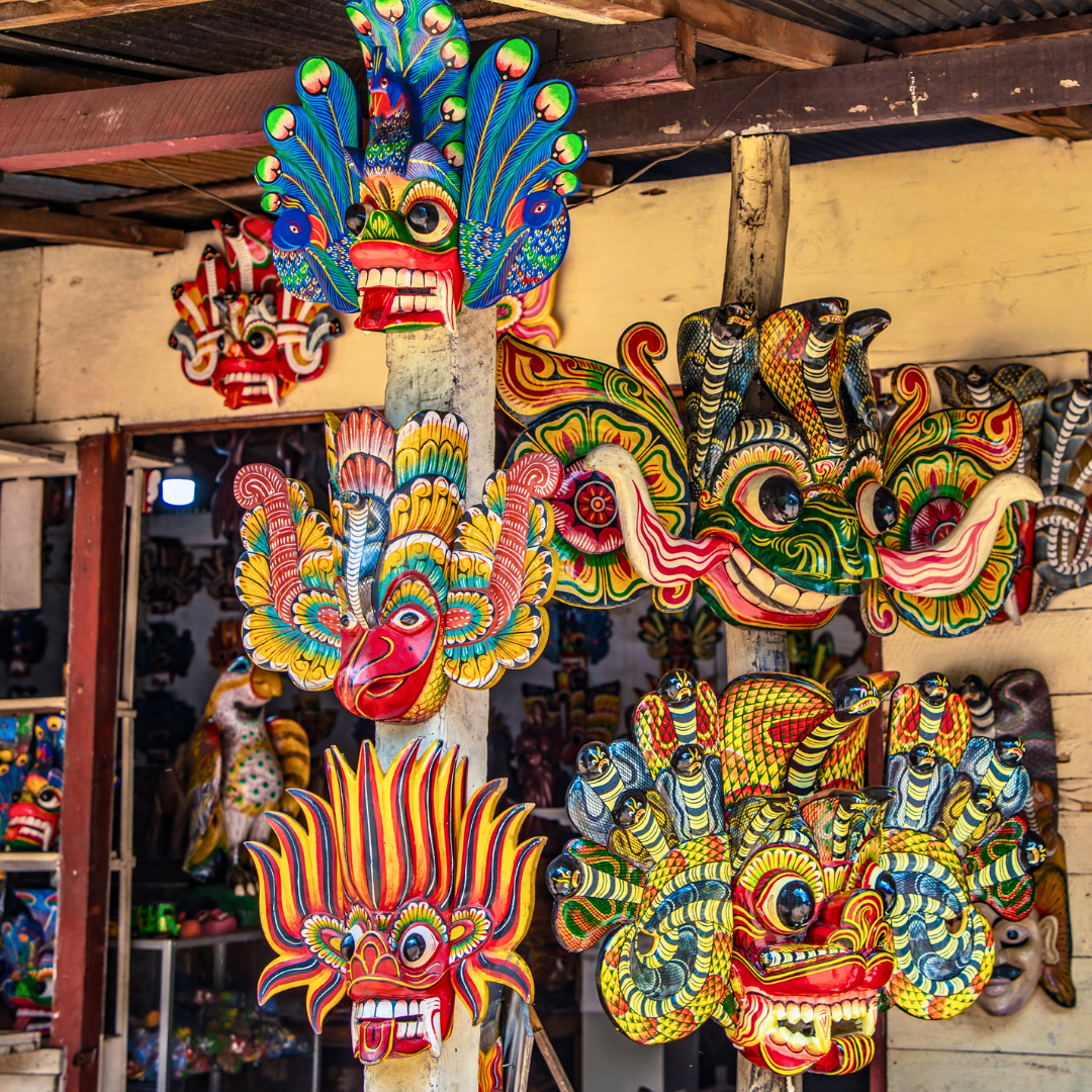 Colourful traditional Sri Lankan masks displayed, reflecting the island’s distinctive folk art and cultural traditions.