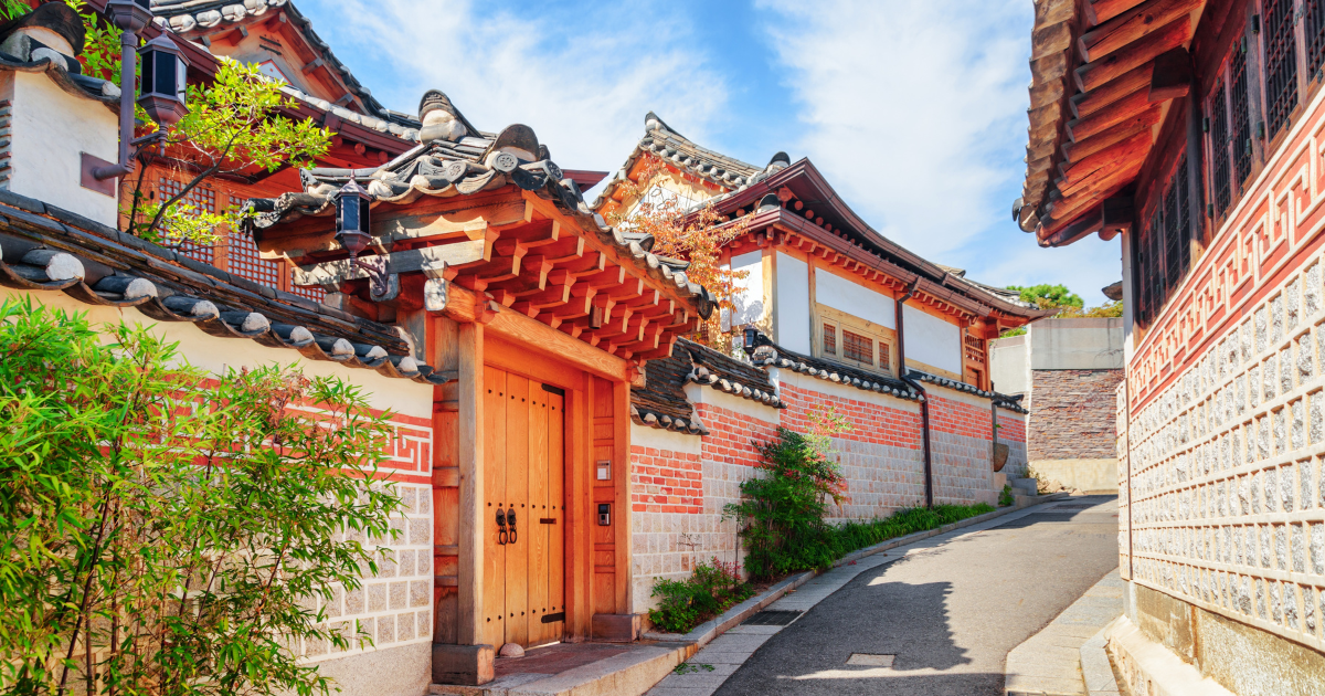 Traditional hanok houses in Bukchon, one of several historic neighbourhoods in Seoul where centuries-old architecture sits minutes from the modern city centre.