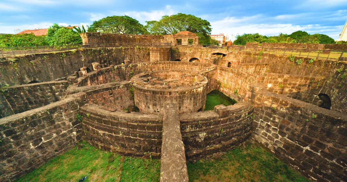 Circular stone foundations at Baluarte de San Diego in Intramuros, Manila