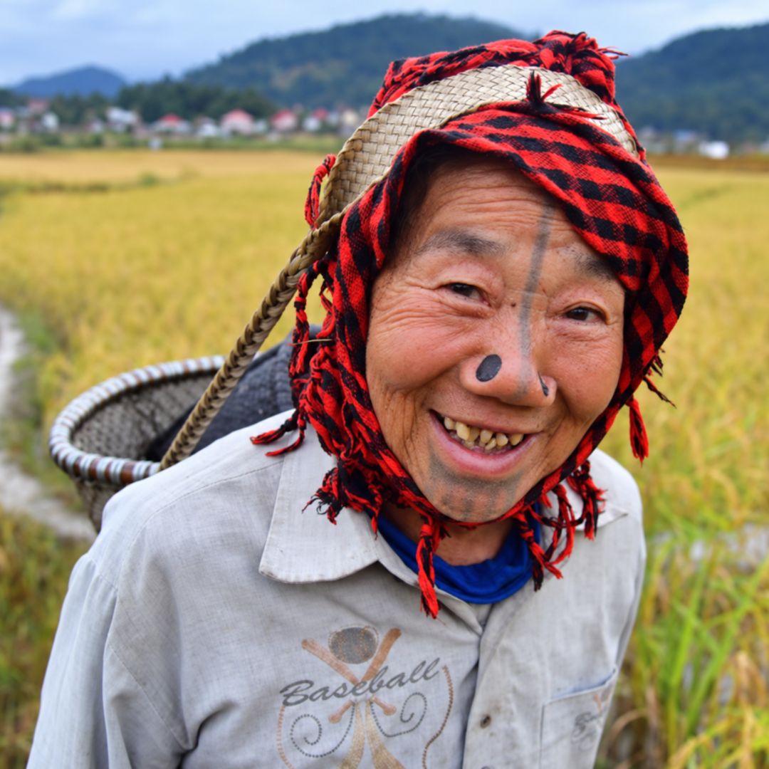 An Apatani woman in Ziro Valley, where village visits and a home cooking session introduce us to life in remote Arunachal Pradesh.