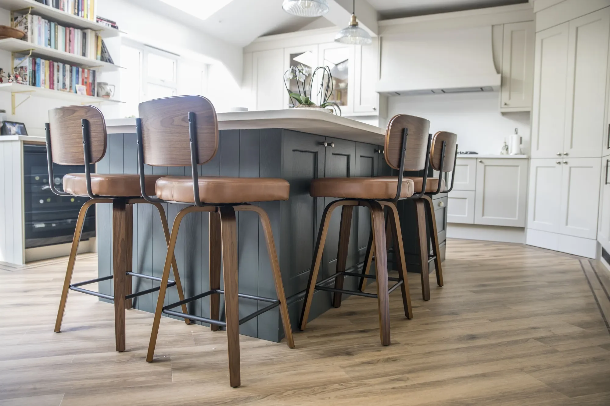 kitchen-extension-16-leather-bar-stools-at-island.webp