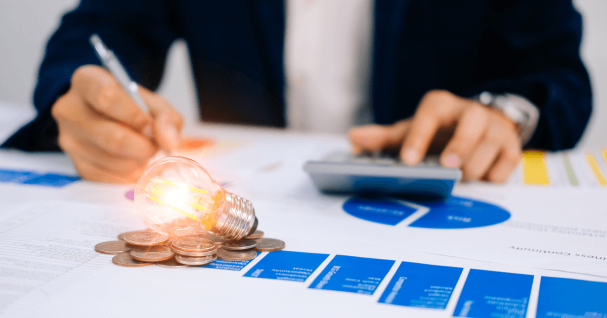 A professional works on utility expense budgeting.