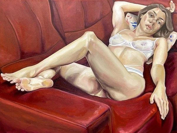 Russell_Nicola_KatieonRedCouch.jpeg
