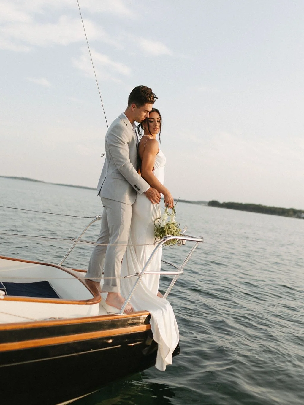 inspired by our love for the east coast &amp; salt air &mdash; prepare to be seasick over this editorial 🐚🌊🦢⚓️🦪🤍

planning &amp; design | @meaghanmacweddings_
photographer | @jwellsphotography 
second shooter | @riazoozeer 
dress | @kindbridal 
