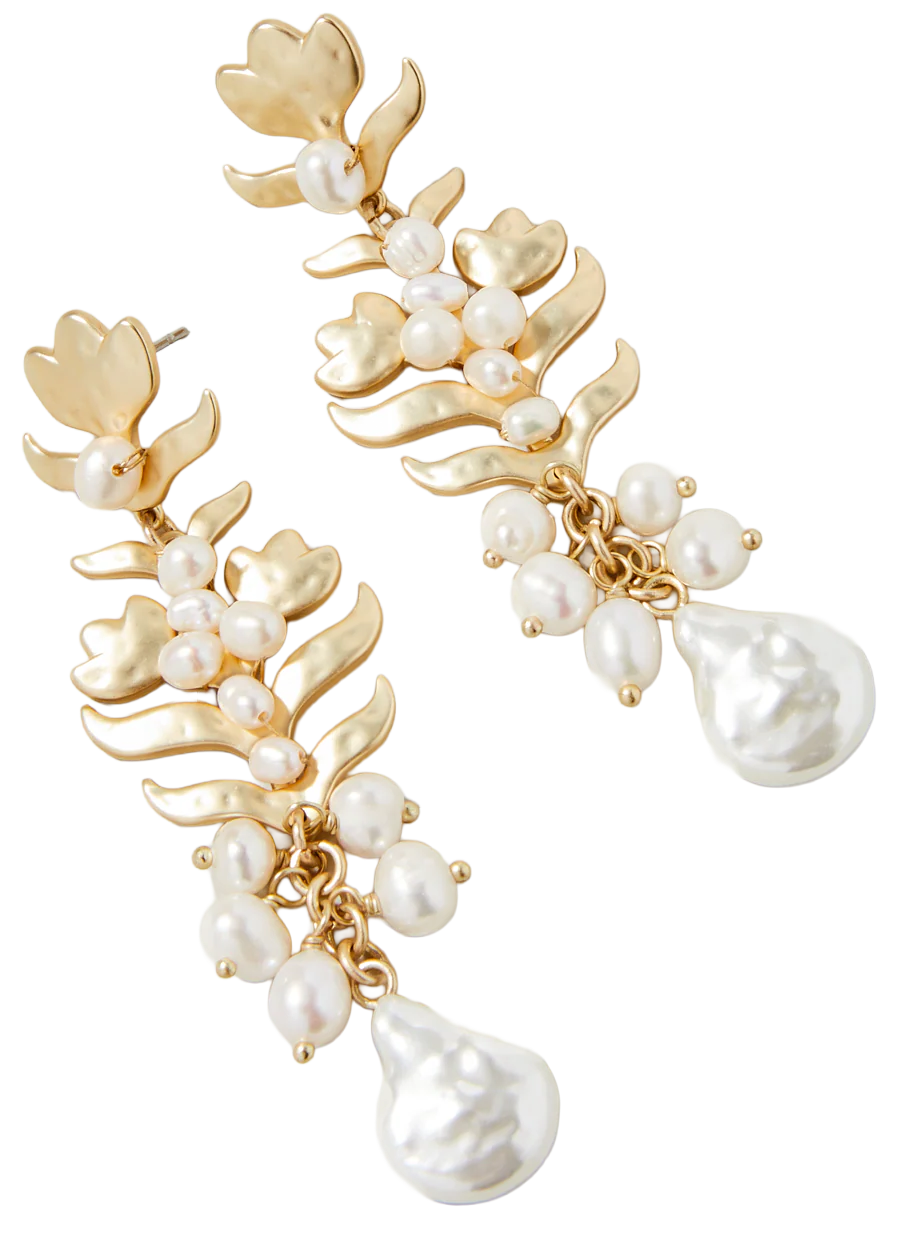 Gold-tone statement earrings with pearl accents and large baroque pearl drops.