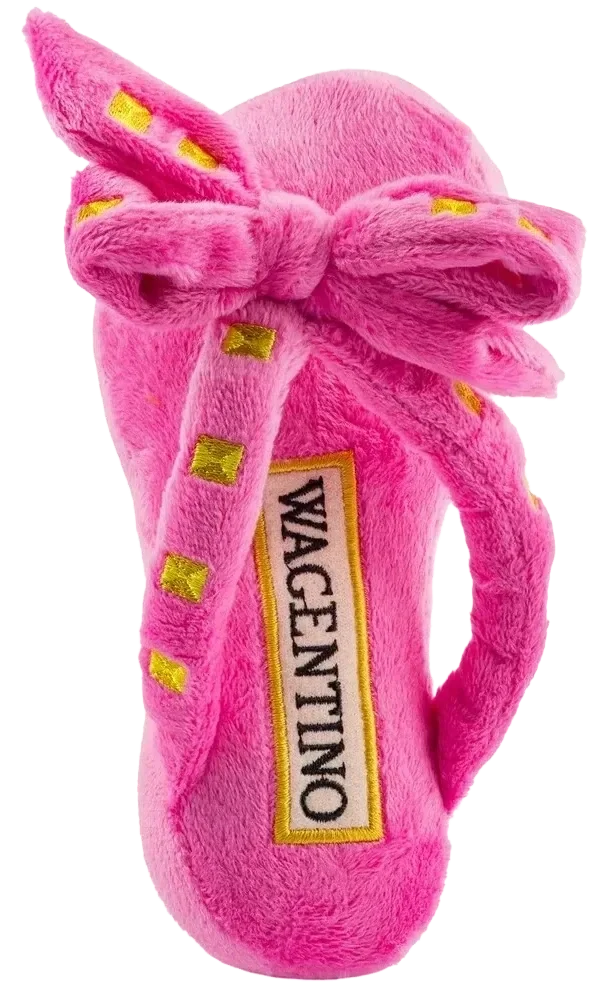 Pink plush golf bag with a large bow, embroidered with the Valley Tinto logo, decorated with yellow square accents.