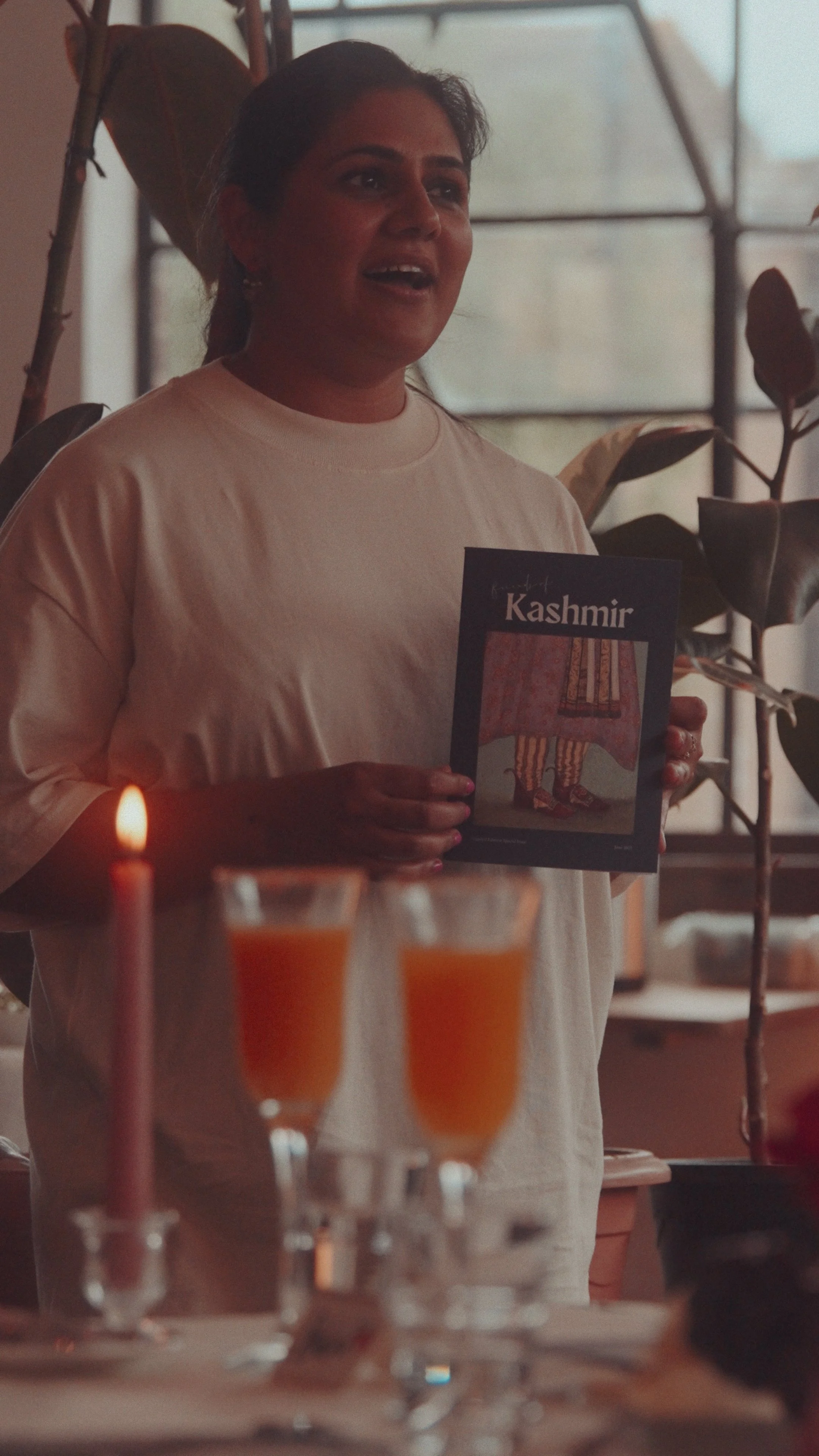 Still from the film, one of the collaborators shares her work on the publication that accompanied the evening.