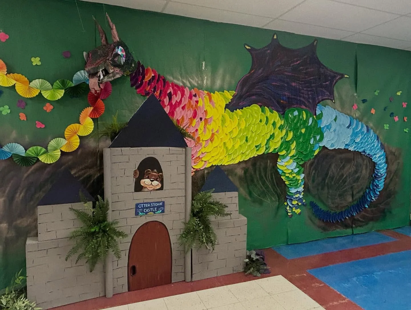 I created this dragon and castle installation for my daughter&rsquo;s school bookfair!  It was a little challenging getting my idea out of my head and onto the wall, but once I got going it was really fun and the faces on the kids face made it all wo