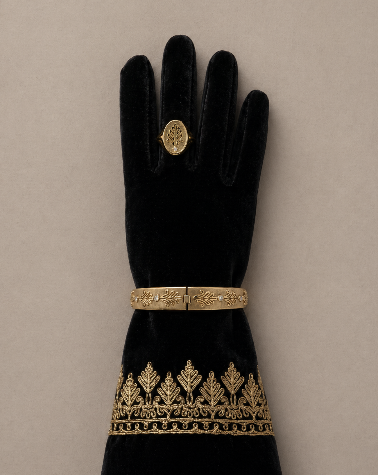 Chirma jewelry collection featuring a signet ring, cuff, and bangle in 18k gold-plated sterling silver with lab-grown diamonds.