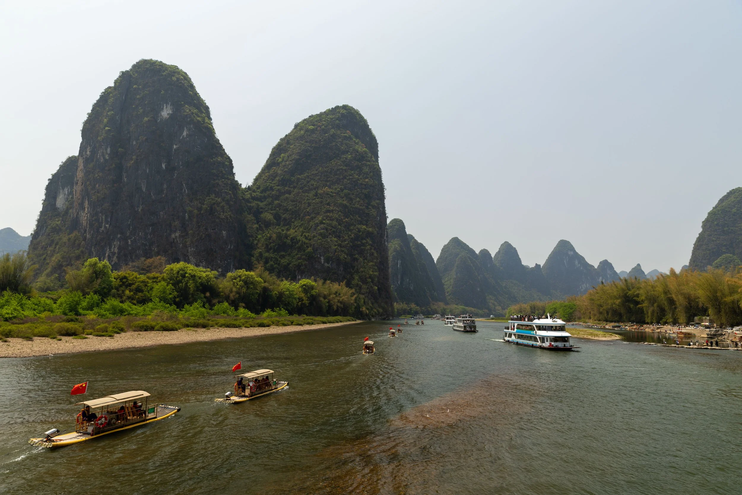 Karst mountains and boats on the Li River, Guangxi, China