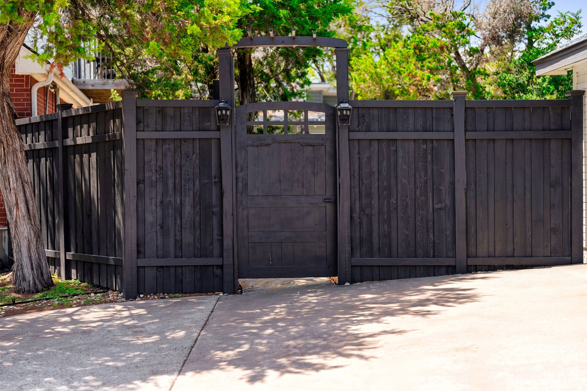 When you arrive you will see a fence with a gate. You can enter the backyard where the waterfall pool is located.