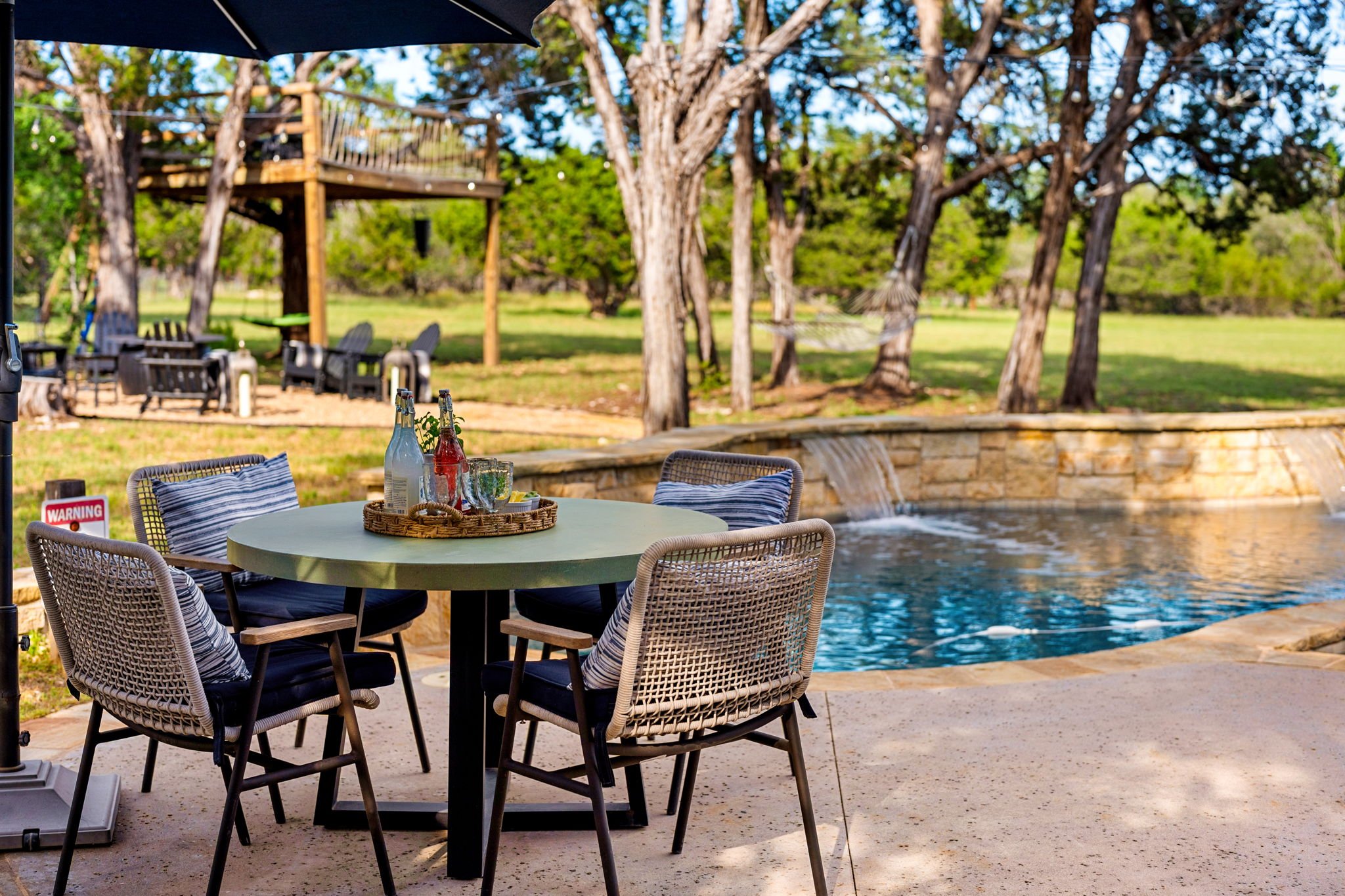 Perfect spot for morning coffee or evening drinks poolside!