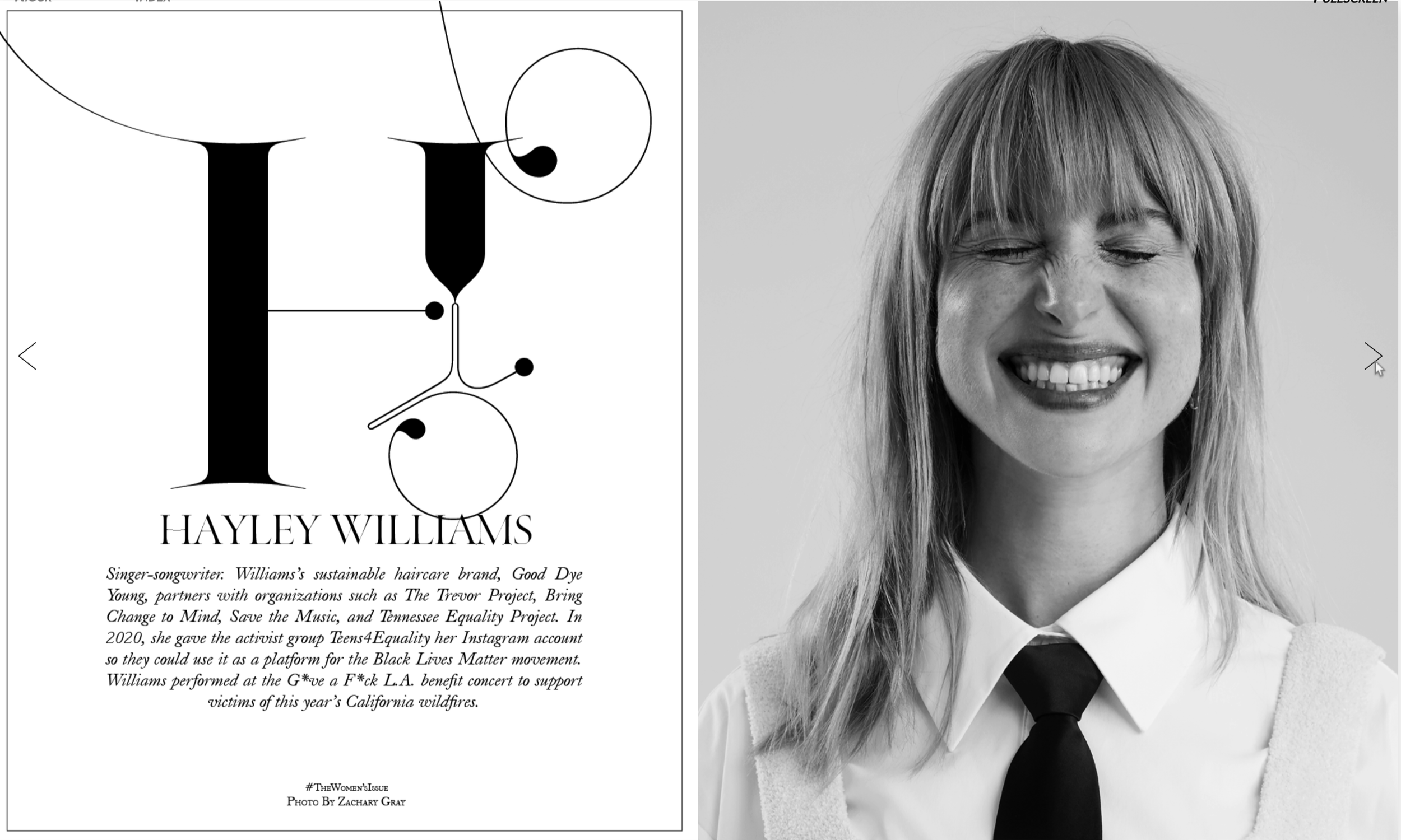 A black and white photograph of a woman with blonde hair, smiling with her eyes closed, wearing a white shirt and a black tie.