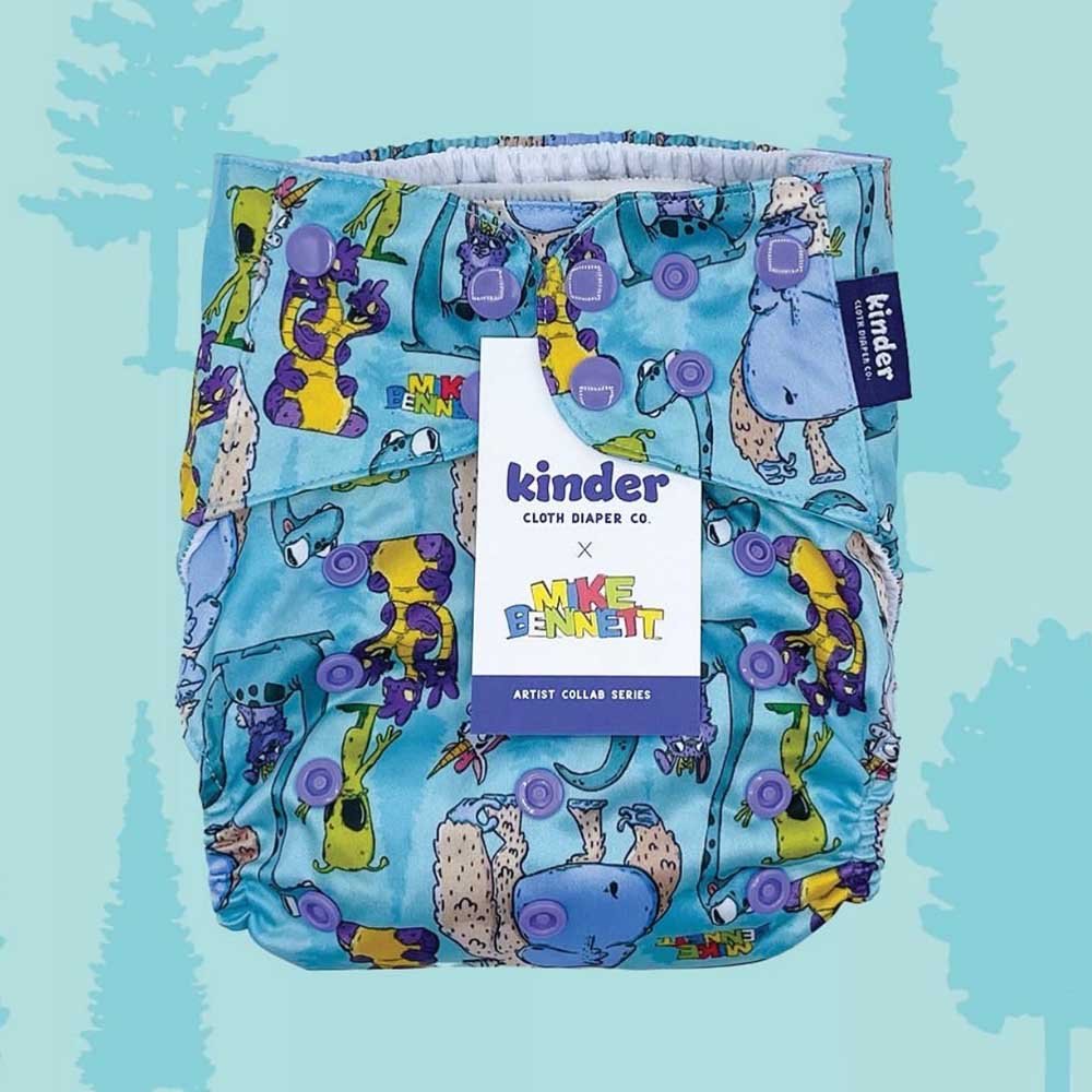 Kinder Cloth Diaper with colorful animal illustrations by Mike Bennett.
