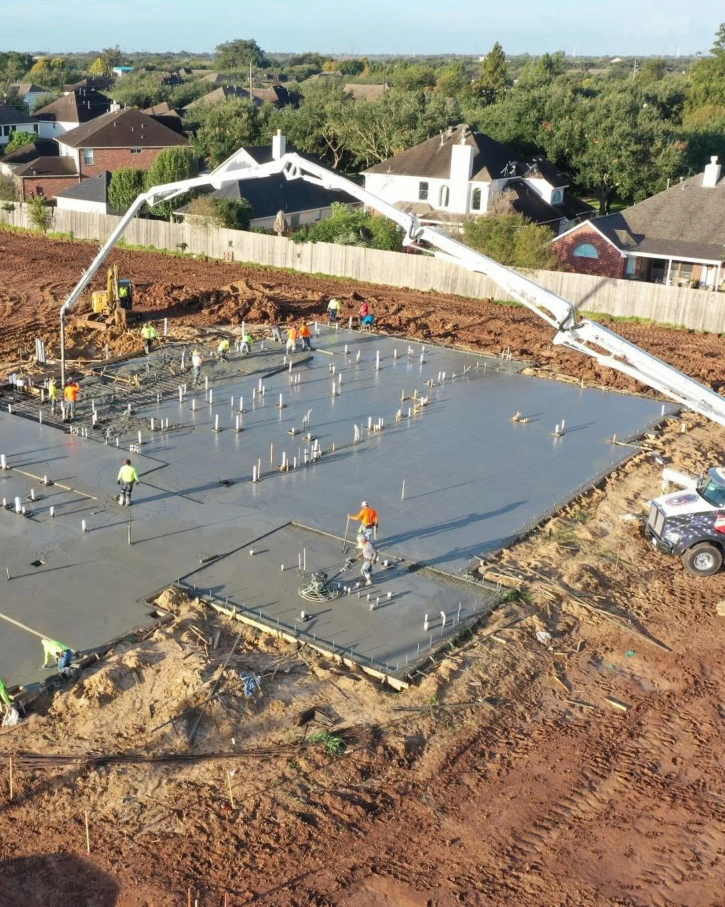 Behind the build &mdash; from slab to structure.

These progress moments from the Johnny Tamales build in Missouri City show what it takes to bring a commercial project to life. From slab pours and structural framing to interior drywall and panel ins