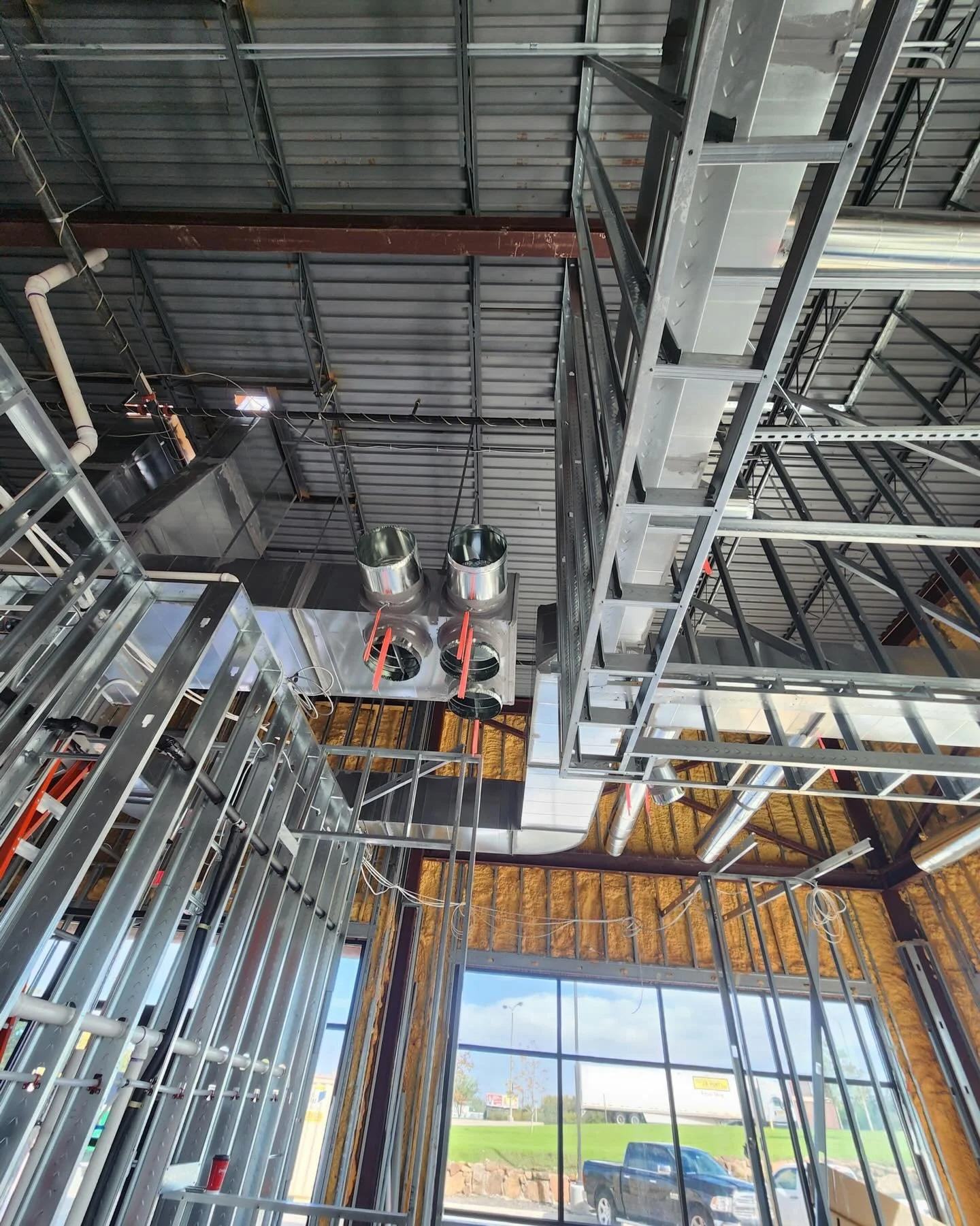 Before the walls close, the real work is already in place.

The mechanical rough-in stage is one of the most critical phases of any commercial build. This is where plumbing top-out, HVAC systems, electrical wiring, and low-voltage systems are install