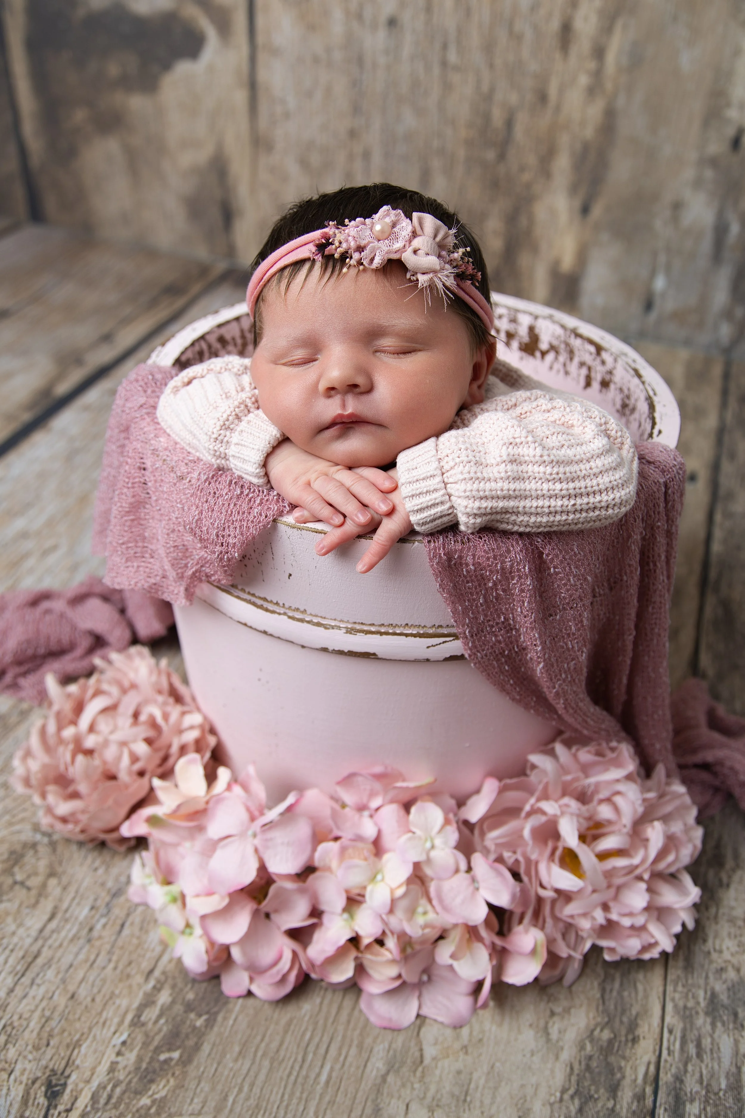 newborn-baby-girl-pink-bowl-flowers-newcastle.jpg