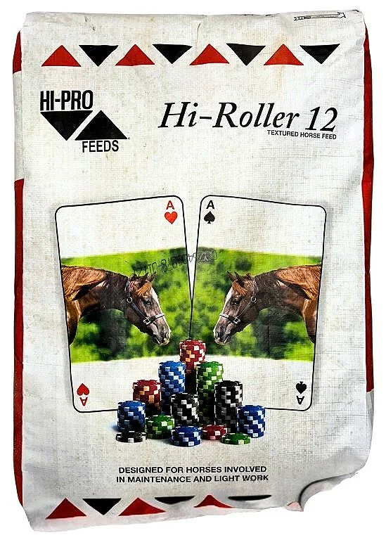 A bag of Hi-Pro Hi-Roller 12 textured horse feed with a playing card design showing two aces, horses, and poker chips.
