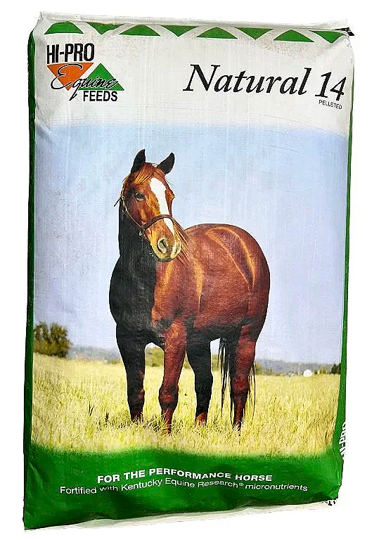 Bag of horse feed labeled "Natural 14" by Hi-Pro Equine Feeds, featuring a horse standing in a grassy field.