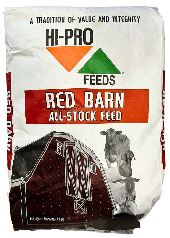 Bag of Hi-Pro Red Barn all-stock feed, branded with the Hi-Pro Feeds logo and slogan 'A Tradition of Value and Integrity', showing a red barn and images of cows and calves.