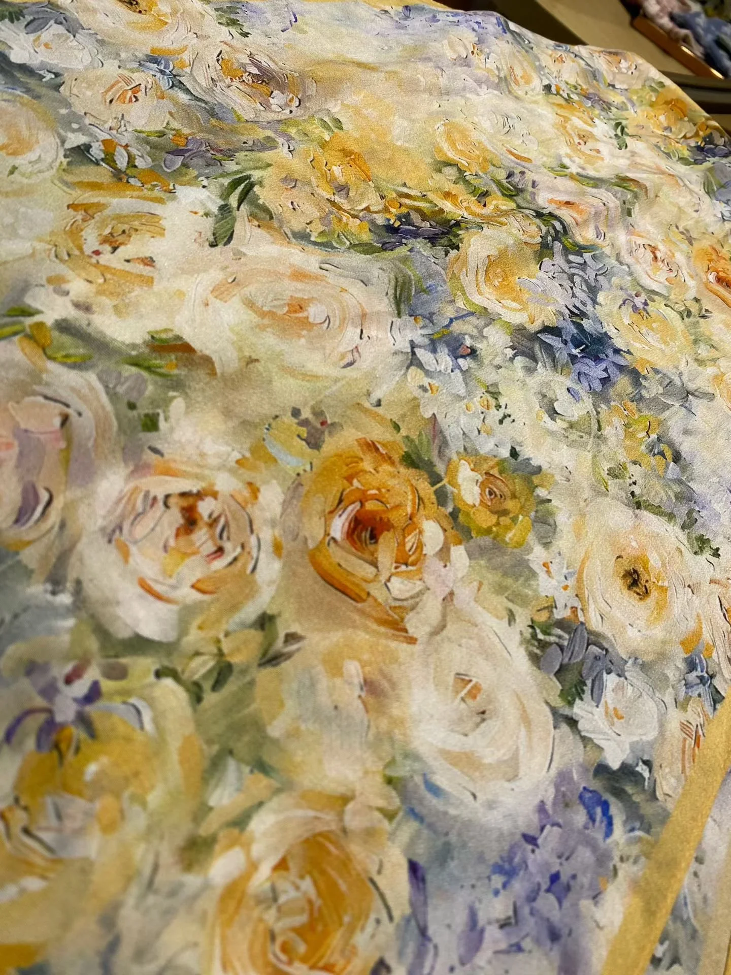 100% natural Mulberry silk fabric featuring an Impressionist yellow rose floral pattern, woven with authentic heritage Suzhou sericulture craftsmanship.