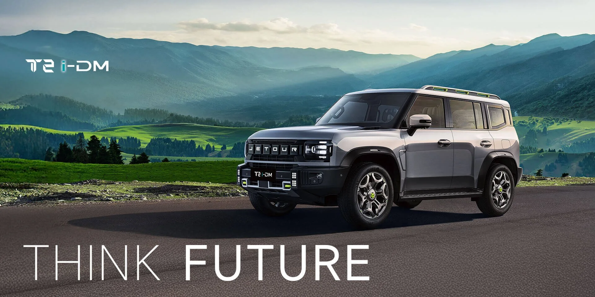 SUV parked on scenic road with mountainous landscape in background, featuring large "THINK FUTURE" text.