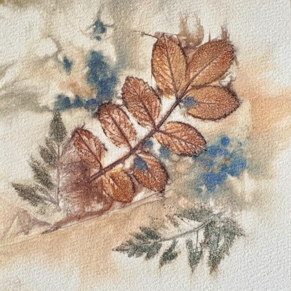 Watercolor painting of autumn leaves, including a brown leaf with smaller leaves and blue berries, with soft beige and green background.