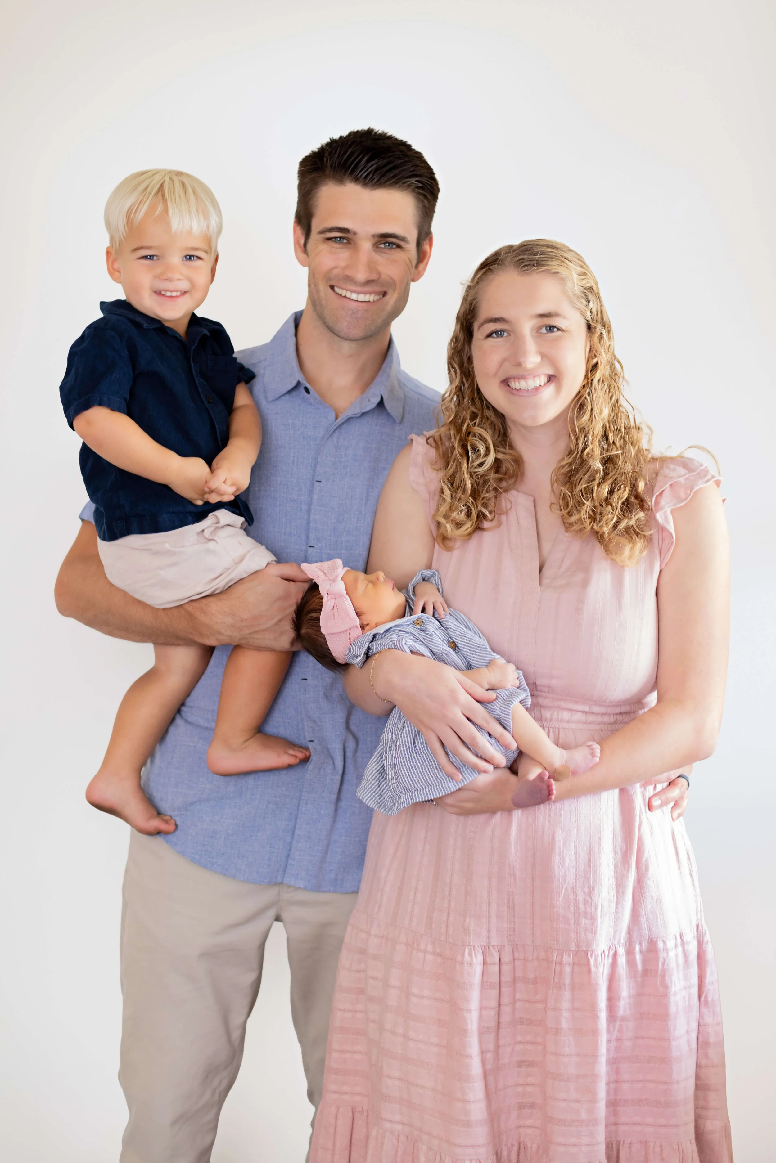Harrison Davis with his wife Ashley and their children