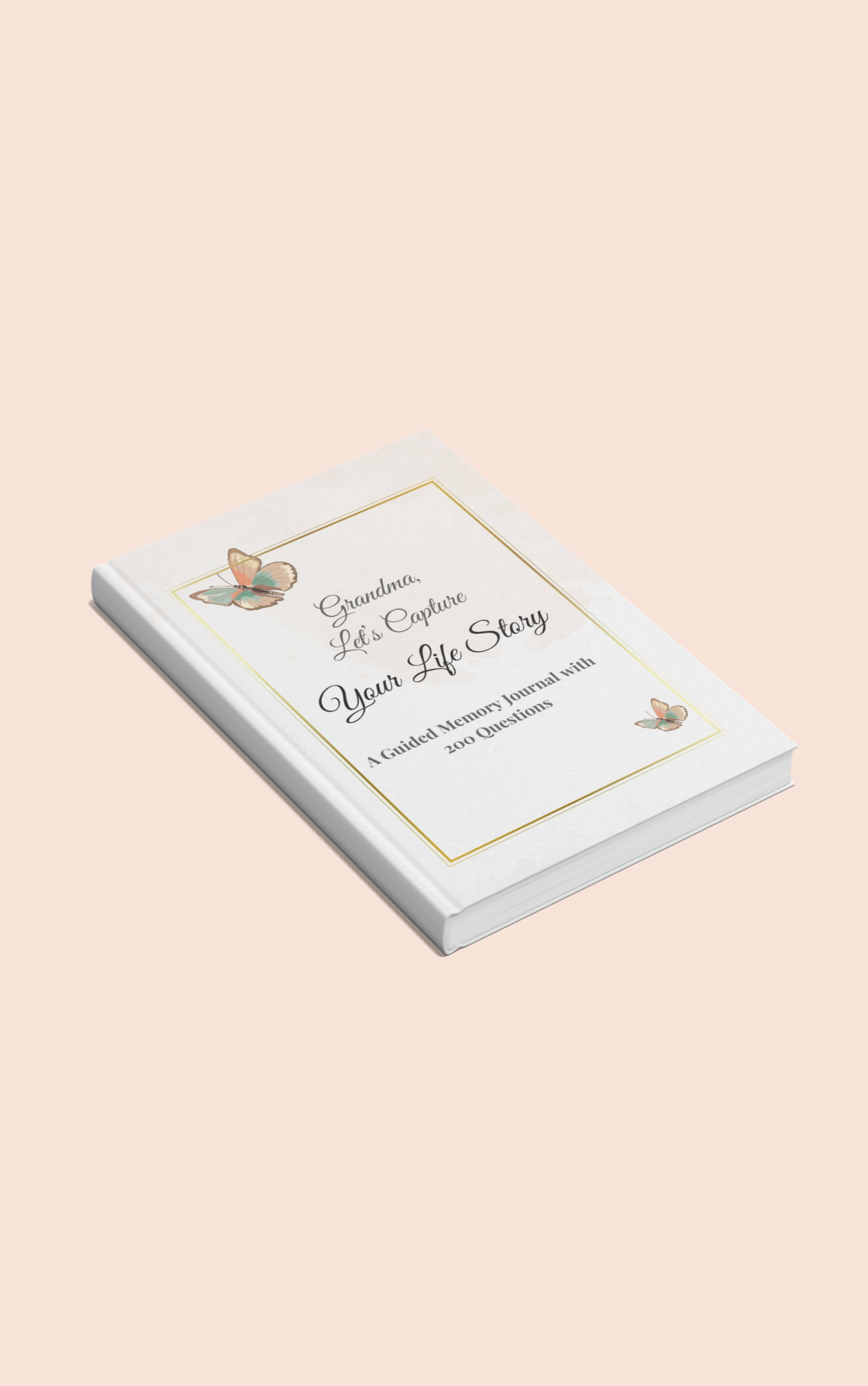 A white guided memory journal with a butterfly on the cover, titled 'Grandma, Let's Capture Your Life Story', lying on a light pink background.
