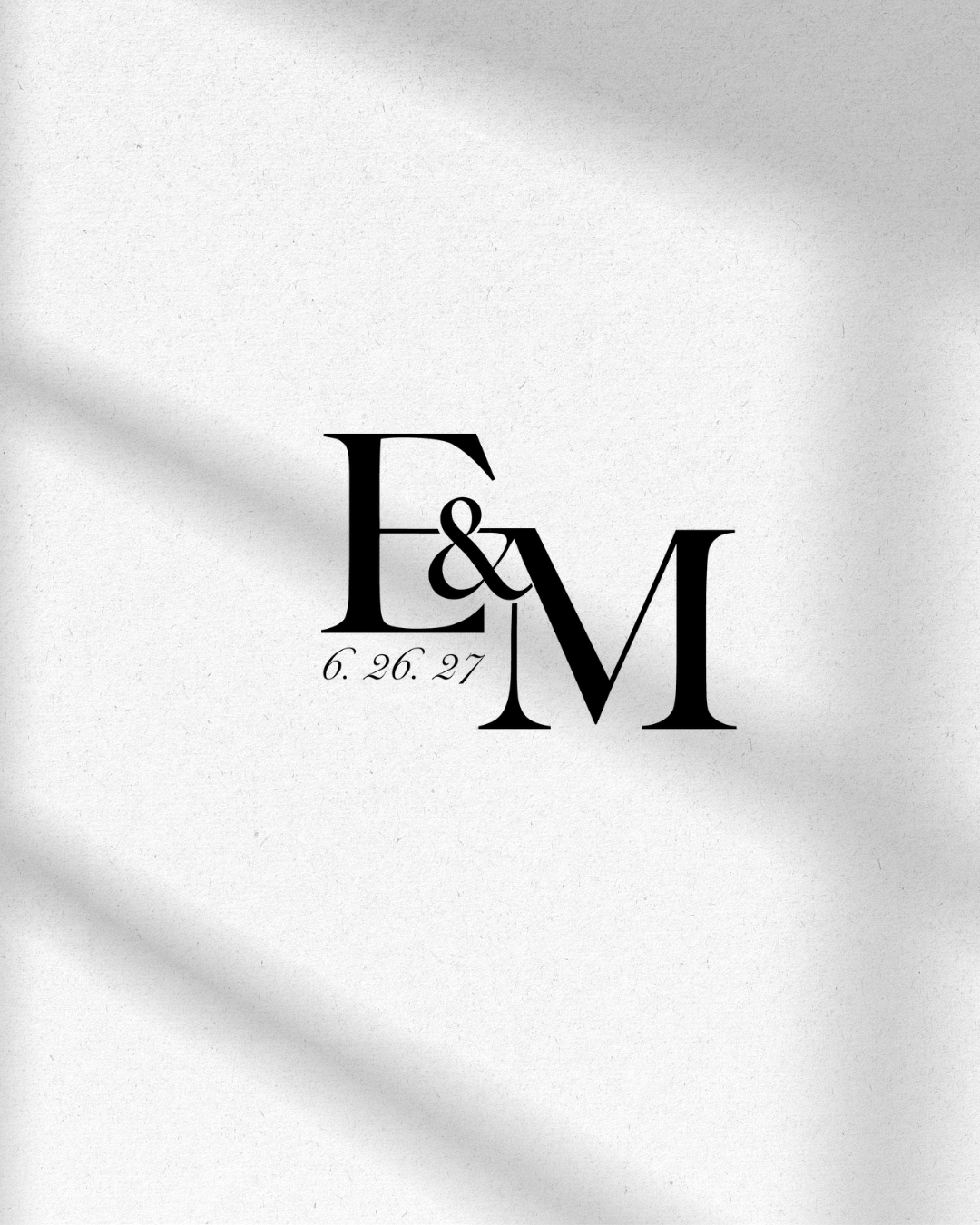 Wedding invitation with custom black monogram. 