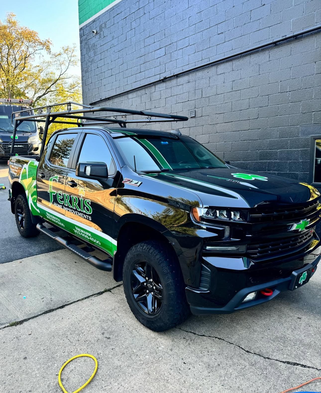 Wrapped contractor pickup truck after fleet cleaning