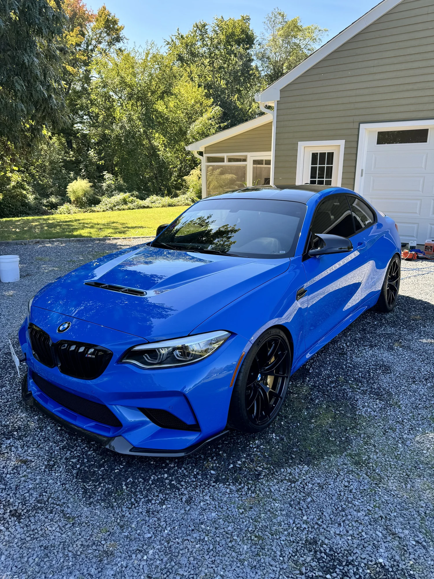 Blue BMW M2 after an exterior detail