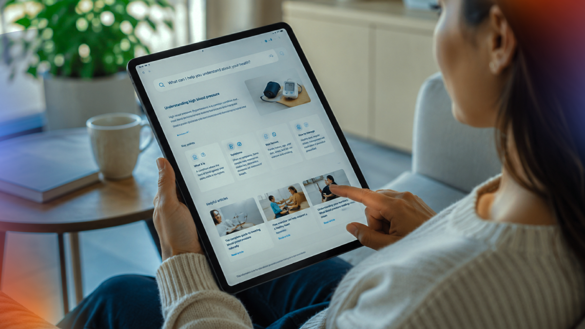 Patient using a tablet to research health information online, representing the growing role of digital platforms and AI in the healthcare journey.