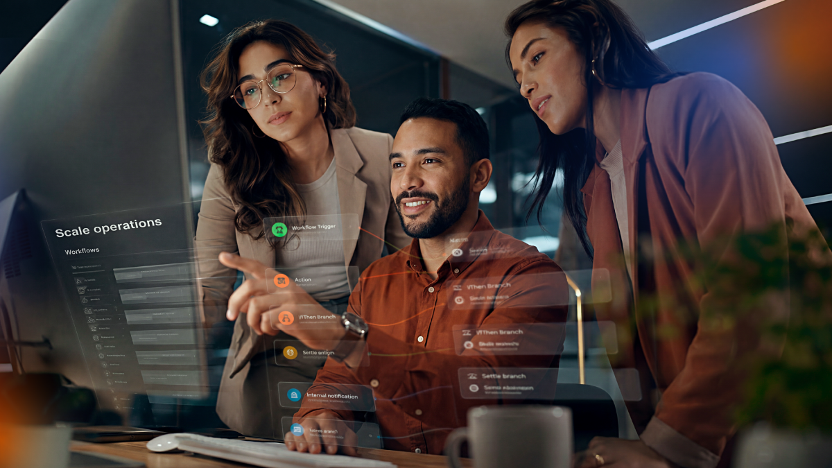 Team reviewing HubSpot workflow automation on a digital interface, representing connected processes that streamline operations and support scalable business growth.