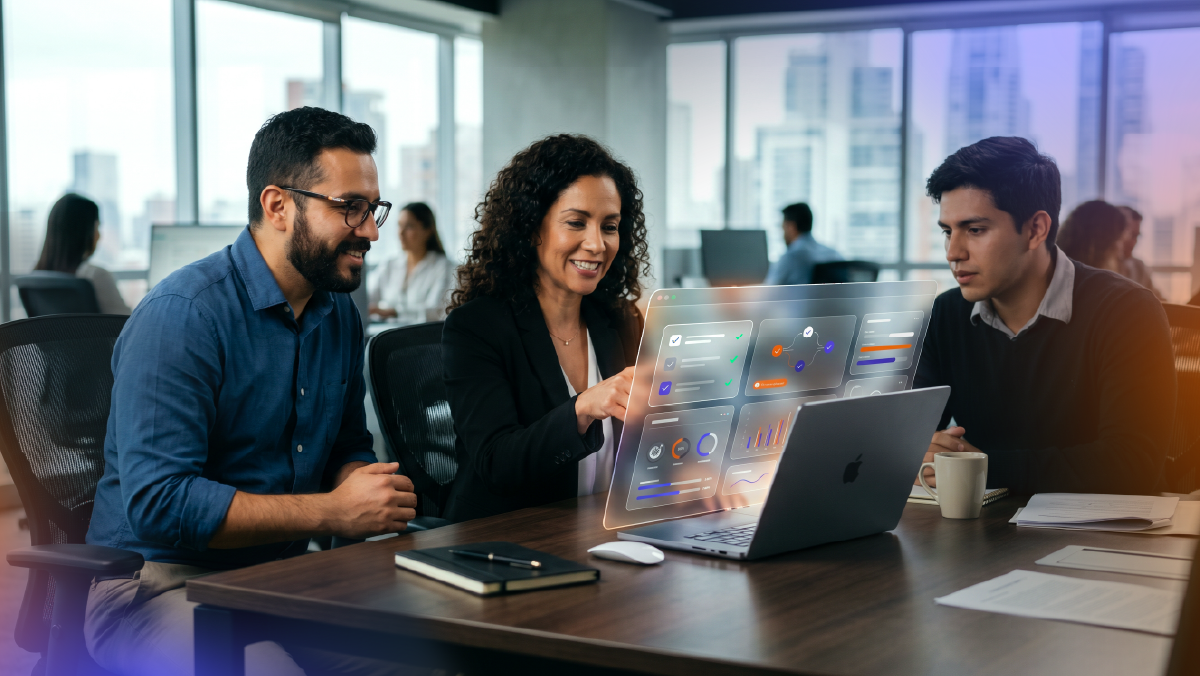 Team analyzing dashboards and workflows on a laptop, representing CRM automation implementation, performance tracking and continuous optimization of sales processes.