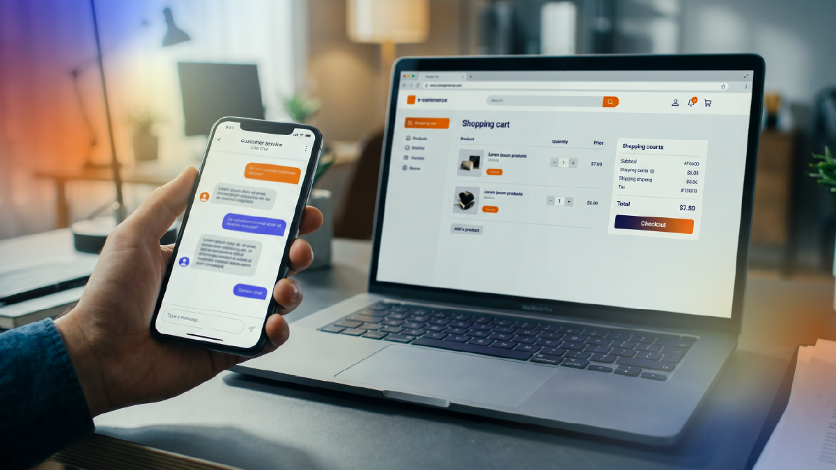 Person using a laptop and mobile device managing customer interactions manually, representing repetitive CRM tasks and lack of automation in sales processes.