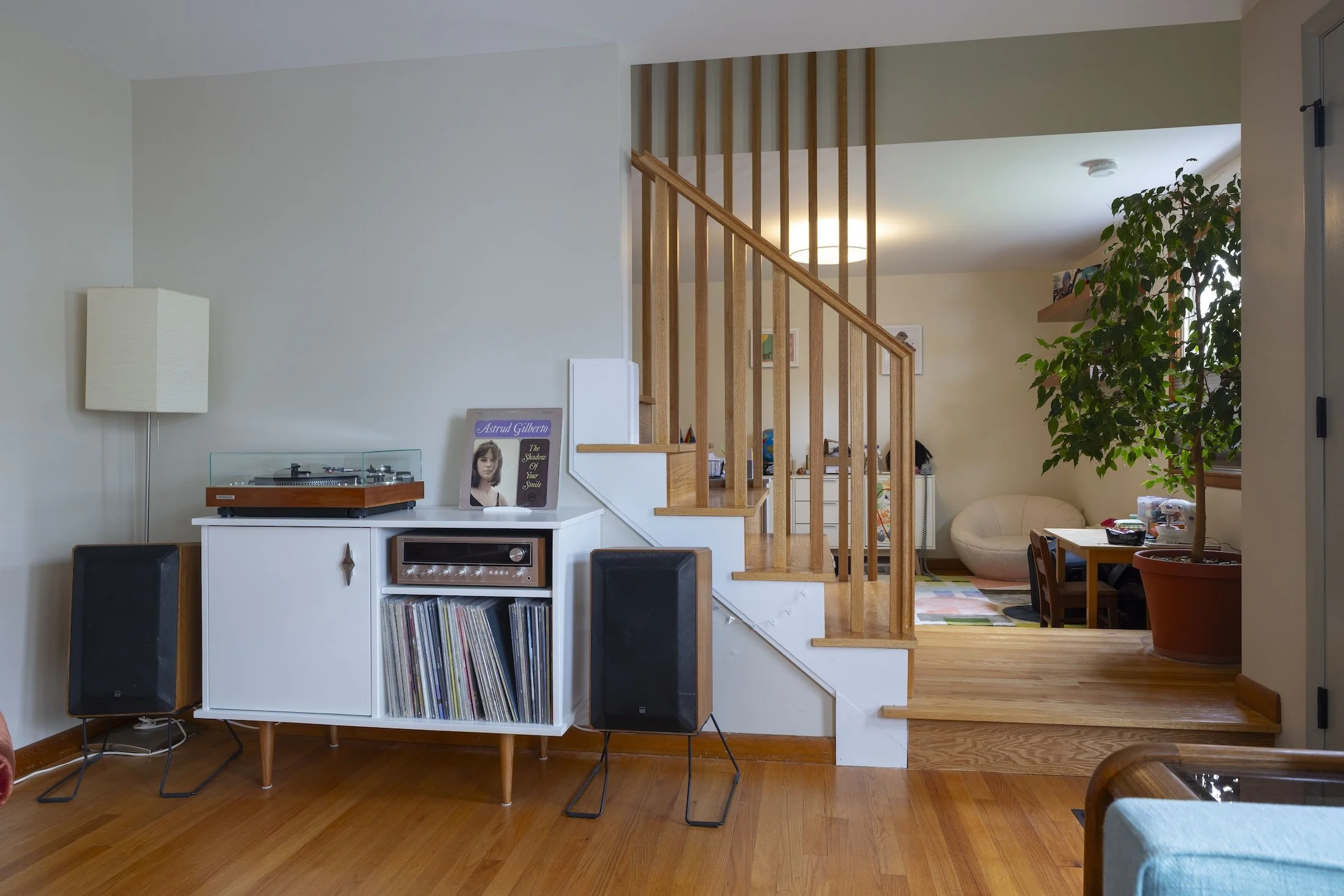 A warm seashell unites all the living spaces in this open concept renovation.