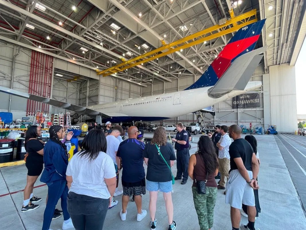 students-with-airplane.jpeg