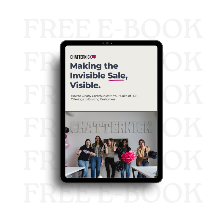 Tablet displaying a presentation titled 'Making the Invisible Sale, Visible,' with five women holding pink and black pom-poms, standing in front of a 'CHATTERKICK' sign.