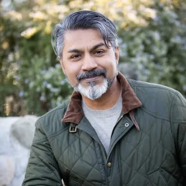 Headshot of writer Arvind Ethan David