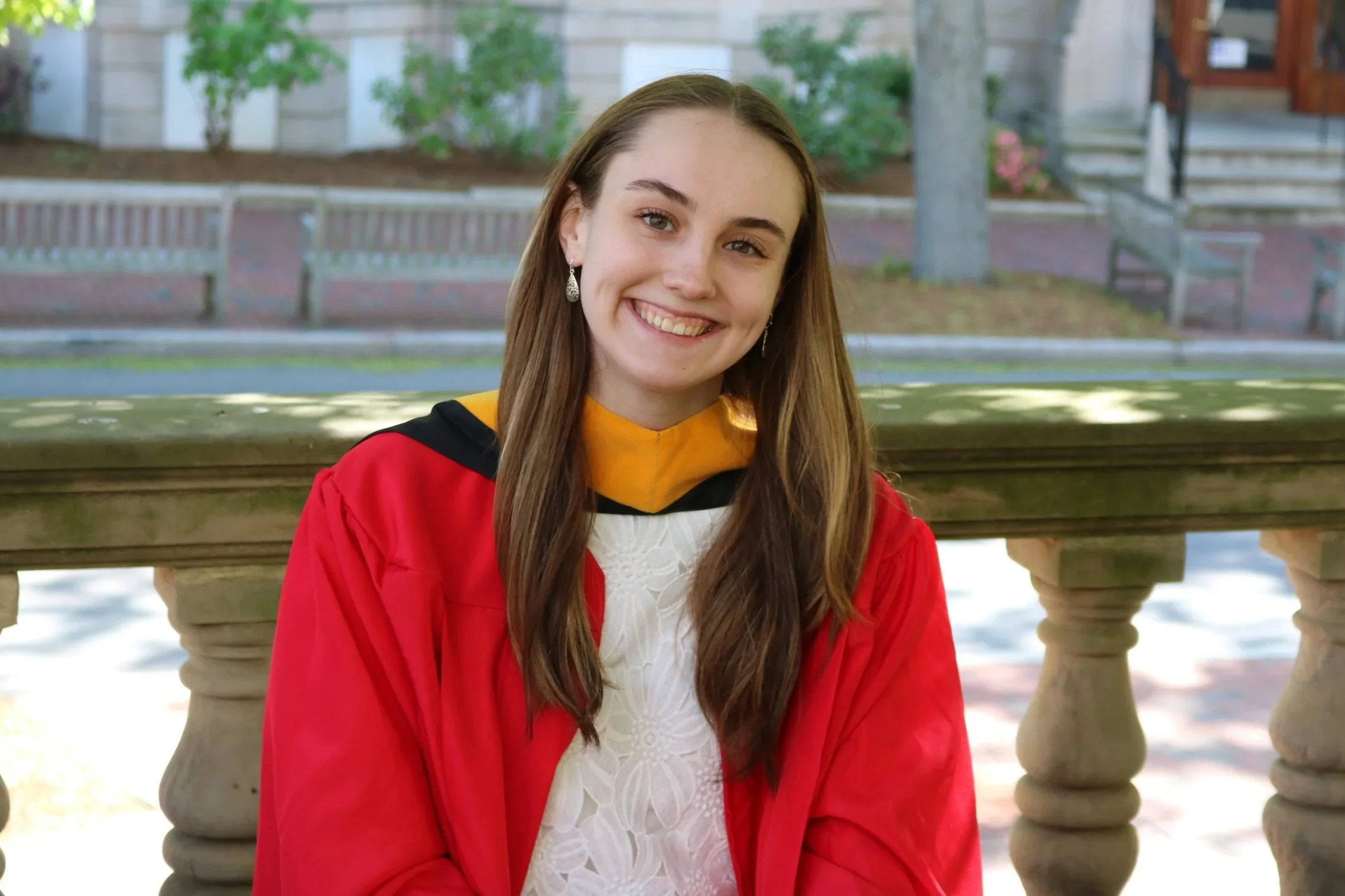 Picture of Kaylee Porter wearing graduation regalia.