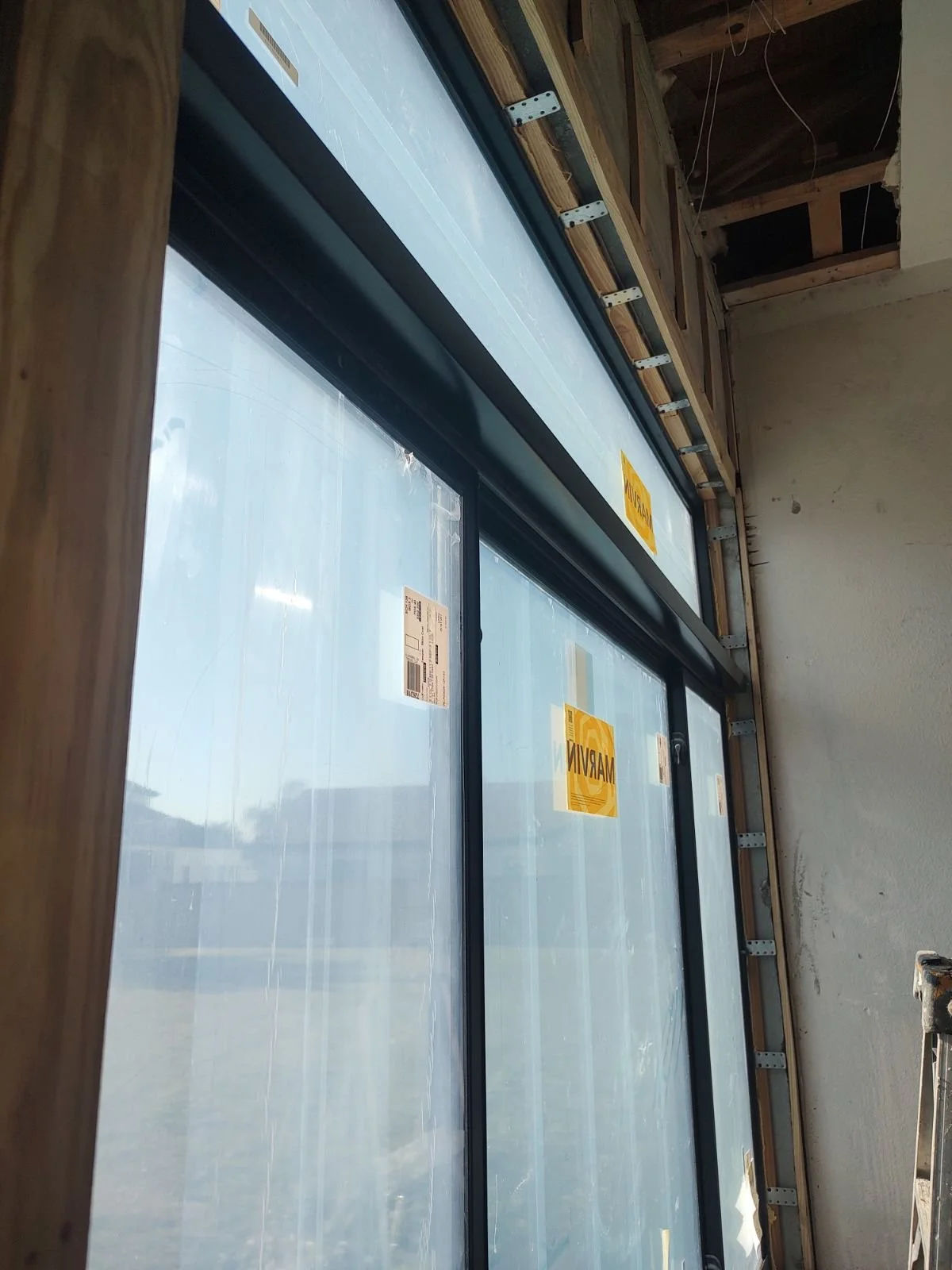 New construction large impact window replacement 